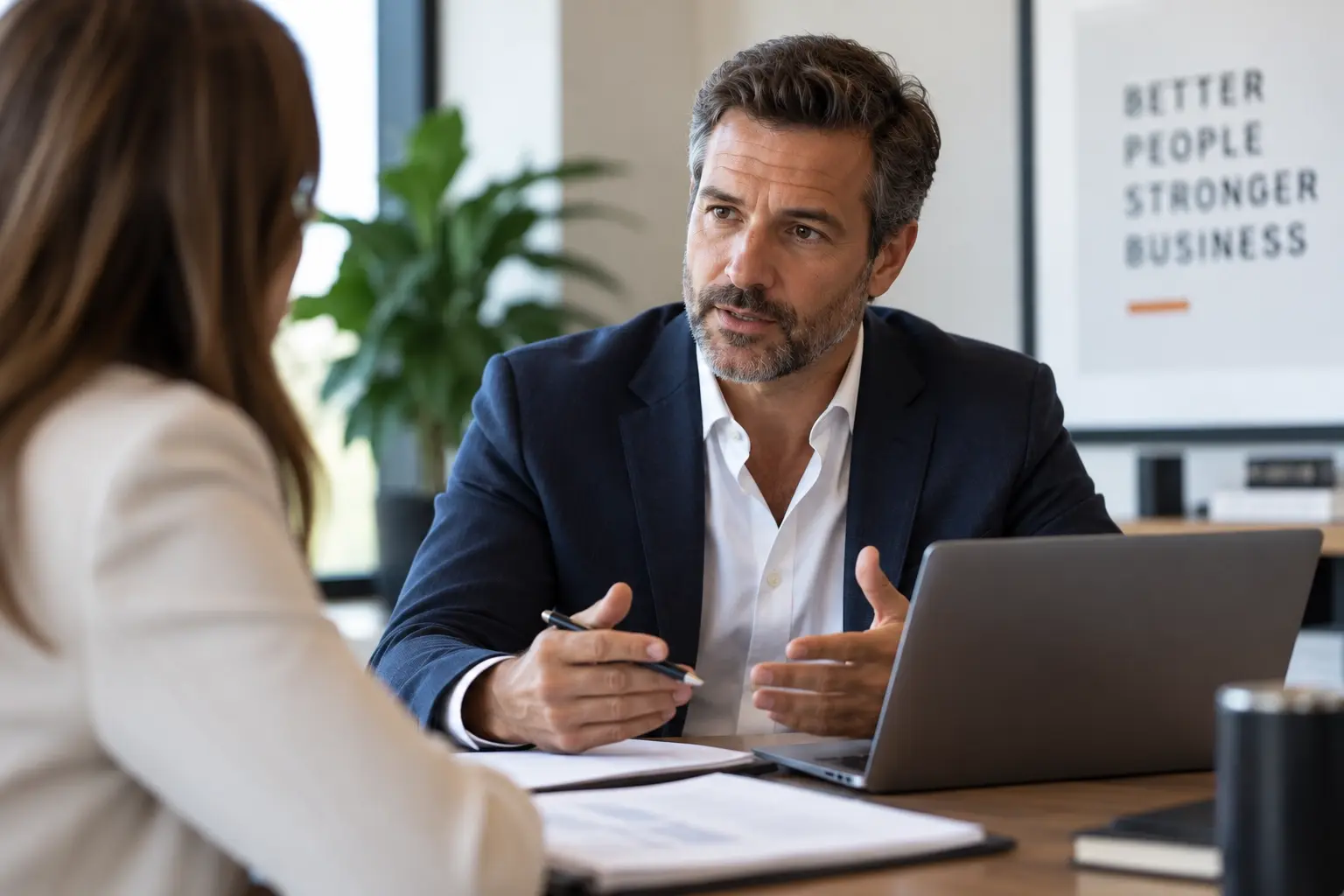 Advisor helping a business leader manage a PEO relationship